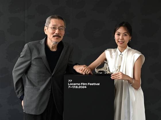 Locarno: Locarno,Switzerland Locarno Film Festival 2024 Award Ceremony photocall Locarno Film Festival 2024 SUYOOCHEON film by Hong Sangsoo director Pardo Argento Award and Kim Minhee actress best performance In the photo:Kim Minhee actress best performance Pardo Argento Award and Hong Sangsoo director Locarno  - ZUMAp169 20240817_zea_p169_156 Copyright: xNickxZonnax