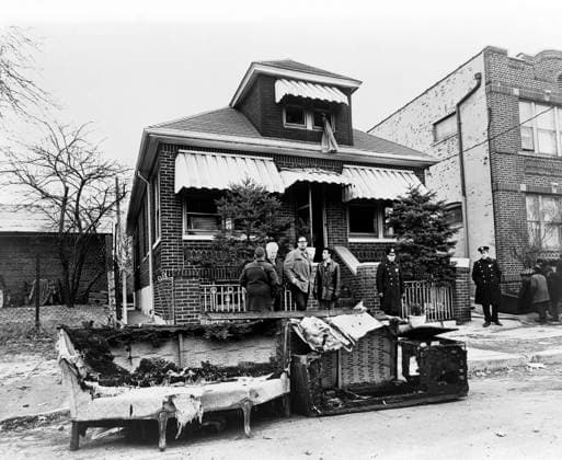Exterior view of the home of Malcolm X after it was firebombed, remains of charred furniture in foreground, 23-11 97th Street, East Elmhurst, Queens, New York City, New York, USA, Stanley Wolfson, New York World-Telegram and the Sun Newspaper Photograph Collection, February 14, 1965 Copyright: xCircaxImagesx ghi-circa12788