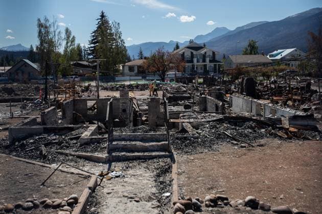 August 19, 2024, Jasper, Ab, CANADA: Workers continues to assess, repair and rebuild as some residents return to Jasper, Alberta on Monday August 19, 2024. Wildfire caused evacuations and widespread damage in the National Park and Jasper townsite. Jasper CANADA  - ZUMAc35_ 20240819_zaf_c35_068 Copyright: xAmberxBrackenx
