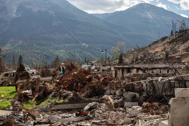 August 19, 2024, Jasper, Ab, CANADA: Workers continues to assess, repair and rebuild as some residents return to Jasper, Alberta on Monday August 19, 2024. Wildfire caused evacuations and widespread damage in the National Park and Jasper townsite. Jasper CANADA  - ZUMAc35_ 20240819_zaf_c35_084 Copyright: xAmberxBrackenx
