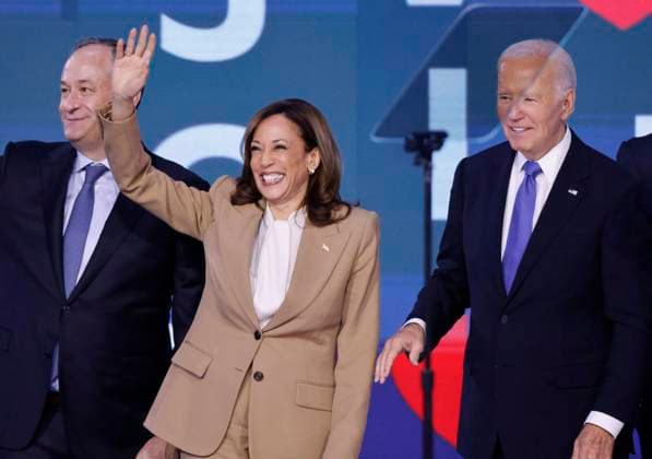 President Joe Biden, Democratic presidential candidate Vice President Kamala Harris and Second Gentleman Doug Emhoff stand on stage after Biden delivered an address at the 2024 Democratic National Convention at the United Center in Chicago, Illinois on Monday, August 19, 2024. The convention will be held from Monday, August 19, until Thursday, August 22.  CHI20240819941 TANNENxMAURY