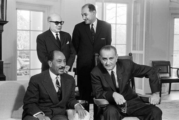February 2, 1966, Washington, District Of Columbia, USA: U.S. President Lyndon B. Johnson, seated with Anwar Sadat, President of the National Assembly of Egypt, Washington, D.C., USA, Marion K. Trikosko, U.S. News & World Report Magazine Photograph Collection, February 2, 1966 Washington USA  - ZUMAg145 19660202_aza_g145_001 Copyright: xJTxVintagex