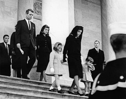 November 24, 1963, Washington, District Of Columbia, USA: Former U.S. First Lady Jacqueline Kennedy and her children, Caroline Kennedy and John F. Kennedy, Jr., exiting U.S. Capitol Building where late U.S. President John Kennedy lies in state, walking behind: Peter Lawford, U.S. Attorney General, Robert F. Kennedy, Patricia Kennedy Lawford, Washington, D.C., USA, Abbie Rowe, White House Photographs, November 24, 1963 Washington USA - ZUMAg145 19631124_aza_g145_003 Copyright: xJTxVintagex