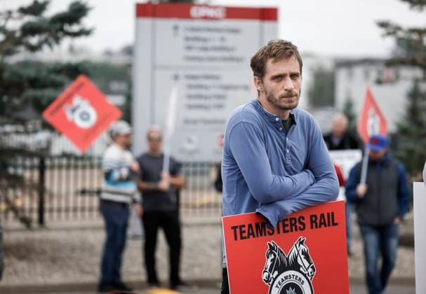 August 22, 2024, Calgary, Ab, CANADA: Teamsters Canada Rail Conference members walk a picket line at the CPKC headquarters in Calgary, Alta., Thursday, Aug. 22, 2024. Calgary CANADA  - ZUMAc35_ 20240822_zaf_c35_053 Copyright: xJeffxMcintoshx