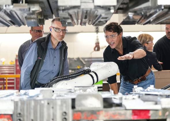 August 22, 2024, Sherbrooke, Pq, CANADA: Prime Minister Justin Trudeau, right, tours Verbom, a sheet metal processing company for the automotive and recreational vehicle industry in Sherbrooke, Que., Thursday, Aug. 22, 2024. Sherbrooke CANADA - ZUMAc35_ 20240822_zaf_c35_065 Copyright: xChristinnexMuschix