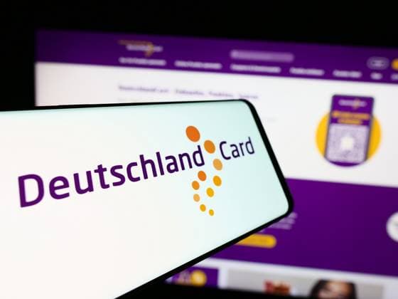 Cellphone with logo of German customer loyalty company DeutschlandCard GmbH in front of website. Stuttgart, Germany - 07-15-2024: Cellphone with logo of German customer loyalty company DeutschlandCard GmbH in front of business website. Focus on center of phone display. Copyright: xZoonar.com TimonxSchneiderx 22091018