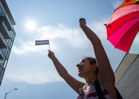 August 25, 2024, Ottawa, On, Canada: A person waves a transgender flag during the Capital Pride Parade in Ottawa, on Sunday, August 25, 2024. Ottawa Canada  - ZUMAc35_ 20240825_zaf_c35_034 Copyright: xChrisxTanouyex