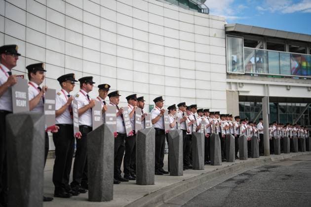 August 27, 2024, Richmond, Bc, CANADA: Air Canada pilots hold signs during an informational picket at Vancouver International Airport in Richmond, B.C., on Tuesday, August 27, 2024. Air Canada pilots voted overwhelmingly to approve a strike mandate last week, putting them in a position to walk off the job as early as Sept. 17. The Air Line Pilots Association, which represents more than 5,400 aviators at the country s largest carrier, said the vote passed with 98 per cent support. Richmond CANADA - ZUMAc35_ 20240827_zaf_c35_025 Copyright: xDarrylxDyckx