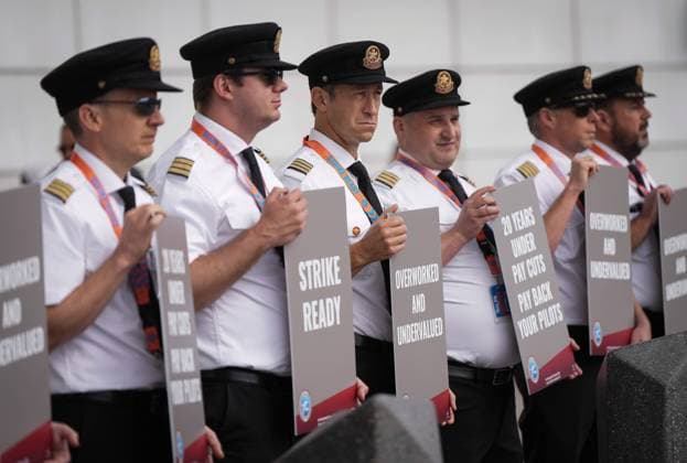 August 27, 2024, Richmond, Bc, CANADA: Air Canada pilots hold signs during an informational picket at Vancouver International Airport in Richmond, B.C., on Tuesday, August 27, 2024. Air Canada pilots voted overwhelmingly to approve a strike mandate last week, putting them in a position to walk off the job as early as Sept. 17. The Air Line Pilots Association, which represents more than 5,400 aviators at the country s largest carrier, said the vote passed with 98 per cent support. Richmond CANADA - ZUMAc35_ 20240827_zaf_c35_030 Copyright: xDarrylxDyckx
