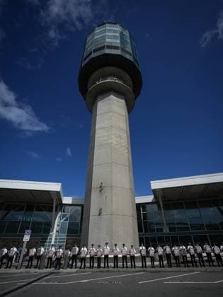 August 27, 2024, Richmond, Bc, CANADA: Air Canada pilots hold signs during an informational picket at Vancouver International Airport in Richmond, B.C., on Tuesday, August 27, 2024. Air Canada pilots voted overwhelmingly to approve a strike mandate last week, putting them in a position to walk off the job as early as Sept. 17. The Air Line Pilots Association, which represents more than 5,400 aviators at the country s largest carrier, said the vote passed with 98 per cent support. Richmond CANADA - ZUMAc35_ 20240827_zaf_c35_031 Copyright: xDarrylxDyckx