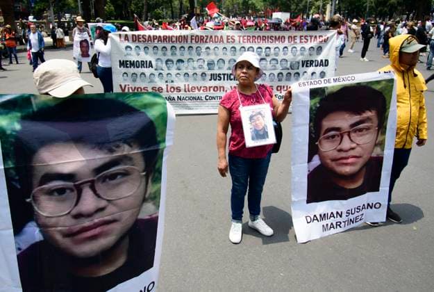 August 30, 2024, Mexico City, Mexico City, Mexico: Relatives of the disappeared and activists participate in the placement of photographs during the protests and a mass at the Paseo de la Reforma roundabout, in Mexico City..In Mexico, the Federal Government presented an update of the census of missing persons in which they reduce 20 thousand cases of the 114 thousand 815 reported by the national registry. Mexico City Mexico - ZUMAn296 20240830_zip_n296_004 Copyright: xJorgexNunezx