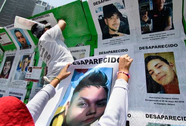 August 30, 2024, Mexico City, Mexico City, Mexico: Relatives of the disappeared and activists participate in the placement of photographs during the protests and a mass at the Paseo de la Reforma roundabout, in Mexico City..In Mexico, the Federal Government presented an update of the census of missing persons in which they reduce 20 thousand cases of the 114 thousand 815 reported by the national registry. Mexico City Mexico - ZUMAn296 20240830_zip_n296_015 Copyright: xJorgexNunezx