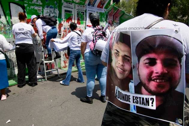 August 30, 2024, Mexico City, Mexico City, Mexico: Relatives of the disappeared and activists participate in the placement of photographs during the protests and a mass at the Paseo de la Reforma roundabout, in Mexico City..In Mexico, the Federal Government presented an update of the census of missing persons in which they reduce 20 thousand cases of the 114 thousand 815 reported by the national registry. Mexico City Mexico - ZUMAn296 20240830_zip_n296_019 Copyright: xJorgexNunezx