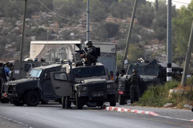 News Themen der Woche KW35 News Bilder des Tages (240901) -- HEBRON, Sept. 1, 2024 -- This photo shows the attack site where three Israeli police officers were killed in the west of Hebron in the southern West Bank, on Sept. 1, 2024. Three Israeli police officers, a female and two males, were killed after Palestinian gunmen opened fire on an Israeli checkpoint in the occupied West Bank on Sunday, according to Israeli authorities. (Photo by Xinhua) MIDEAST-HEBRON-ATTACK-ISRAELI POLICE OFFICERS MamounxWazwaz 