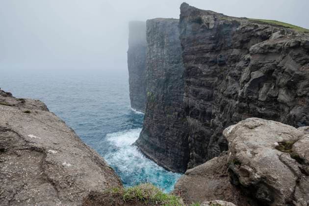 A misty day in the Faroe Islands reveals the towering cliffs at Traelanipa, Faroe Islands, Denmark, Atlantic, Europe Copyright: FrancescoxFanti 1336-1201 RECORD DATE NOT STATED