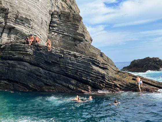 August 3, 2024, New York, New York, USA: Travel and vacations have become all about taking cellphone photos to share on social media and checking certain destinations off the bucket lists that have become crowded due to over tourism. Cinque Terre along the cost of Liguria in Italy, has become one of the top travel bucket list locations. This has led to over full ferries and crowded beaches. Vernazza is another popular stop.. (Photo: Andrea RENAULT Zuma Press) New York USA - ZUMAg115 20240803_faf_g115_053 Copyright: xAndreaxRenaultx