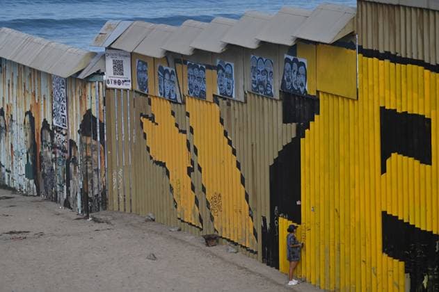 September 6, 2024, Tijuana, Baja California, Mexico: A new interactive mural of deported veterans at the Playas de Tijuana beach border wall, The Deported Veterans Diaspora on the Tijuana, Mexico side of the US-Mexico Border on Friday, September 06, 2024. The work, created by Lizbeth De La Cruz Santana, an assistant professor in the department of Black and Latino Studies at Baruch College in New York City, commemorates 16 war veterans who, after having served in the United States Army, were expelled from the country. The mural depicts the stories of veterans from different countries, such as Mexico, Guatemala, Haiti, the Dominican Republic and Jamaica, among others, who, after having fought on behalf of the United States, faced deportat - ZUMAm180 20240906_zip_m180_008 Copyright: xCarlosxA.xMorenox