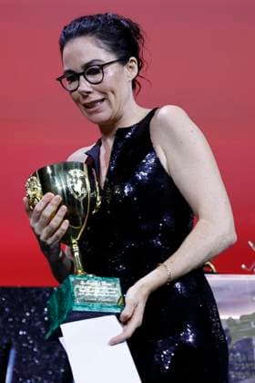 September 7, 2024, Venice, ITALY: Dutch director Halina Reijn acknowledges receiving on behalf of Australian actor Nicole Kidman the Volpi Cup (Coppa Volpi) Award for Best Actress for her performance in the movie Babygirl during the closing ceremony of the 81st annual Venice International Film Festival, in Venice, Italy, 07 September 2024. ANSA FABIO FRUSTACI Venice ITALY  - ZUMAa110 20240907_zaf_a110_113 Copyright: xFabioxFrustacix