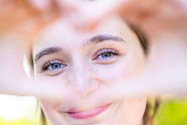 Creative Highlights Symbolfotos Close up image of smiling woman out in nature making a heart shape with hands. Pretty joyful caucasian woman laughing at camera outside. Healthy lifestyle, self love and body care concept Close up image of smiling woman out in nature making a heart shape with hands. Pretty joyful caucasian woman laughing at camera outside. Healthy lifestyle, self love and body care concept. High quality photo ,model released, Symbolfoto Copyright: xZoonar.com BjornxBeheydtx 20432403 ,model released, Symbolfoto ,property released
