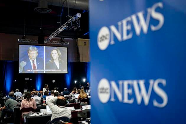 Journalists in the spin room watch the ABC Presidential Debate between Democratic presidential nominee and Vice President Kamala Harris and Republican presidential candidate, former U.S. President Donald Trump at the Pennsylvania Convention Center in Philadelphia, Pennsylvania on Tuesday, September 10, 2024. Trump and Harris will meet for their first, and potentially only, debate in a battleground state less than two months before Election Day.  PHI20240910337 BONNIExCASH