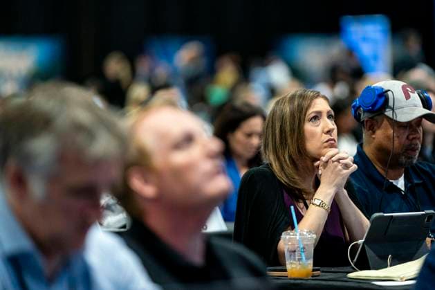 Journalists in the spin room watch the ABC Presidential Debate between Democratic presidential nominee and Vice President Kamala Harris and Republican presidential candidate, former U.S. President Donald Trump at the Pennsylvania Convention Center in Philadelphia, Pennsylvania on Tuesday, September 10, 2024. Trump and Harris will meet for their first, and potentially only, debate in a battleground state less than two months before Election Day.  PHI20240910339 BONNIExCASH