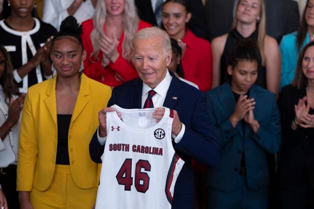September 10, 2024, Washington, District Of Columbia, USA: United States President Joe Biden displays a team jersey presented at a celebration for the University of South Carolina Gamecocks Women™s Basketball Team at the White House in Washington, DC to celebrate their 2023-2024 NCAA championship season at the September 10, 2024 Washington USA - ZUMAs152 20240910_faa_s152_091 Copyright: xChrisxKleponisx