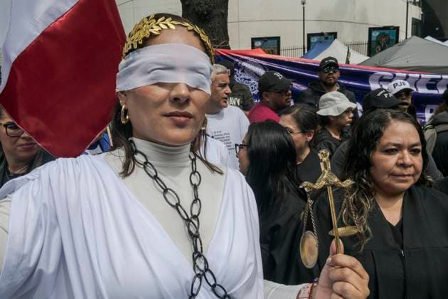 September 10, 2024, Mexico, Mexico: A woman dressed as justice demonstrates outside the Mexican Senate where the new law on judicial reform is being discussed. The protests that are shaking Mexico are a direct response to the judicial reform proposal presented by President AndrÃ s Manuel Lopez Obrador. This reform, which seeks to modify the structure and functioning of the Judiciary, has generated a wave of criticism and mobilizations from various sectors of society. Especially from workers in the Justice system who say this Reform threatens judicial independence: Critics argue that the reform sought to subject the Judicial Branch to the Executive, weakening the separation of powers and putting the independence of judges at risk. Mexi - ZUMAs197 20240910_aaa_s197_449 Copyright: xIsraelxFuguemannx