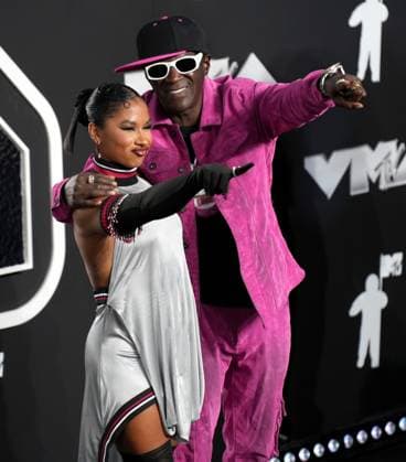 (L-R) Jordan Chiles and Flavor Flav arrive on the red carpet at the 2024 MTV Video Music Awards VMA s at the UBS Arena in Elmont, New York on Wednesday, September 11, 2024.  NYP202409111132 DerekxC.xFrench