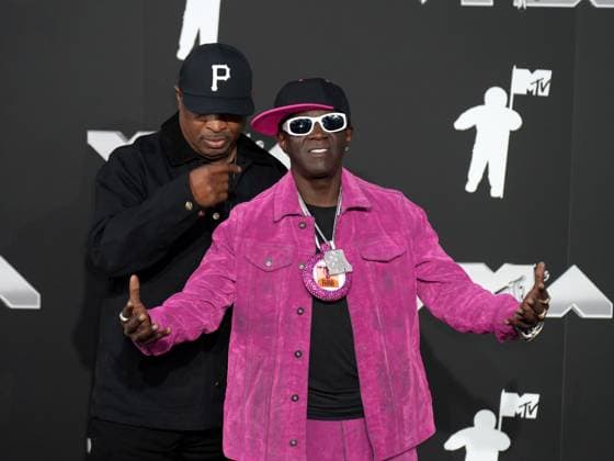 (L-R) Chuck D and Flavor Flav of Public Enemy arrive on the red carpet at the 2024 MTV Video Music Awards VMA s at the UBS Arena in Elmont, New York on Wednesday, September 11, 2024.  NYP202409111147 DerekxC.xFrench
