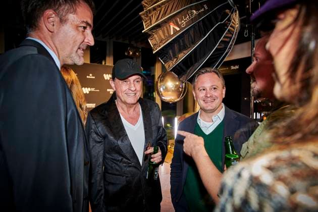 Warner Music Central Europe celebrates in Berlin EUR, Germany, Berlin Musician Peter Schilling 2 from left and Markus Holzherr CFO Warner Music Europe li in conversation with guests Warner Music celebrates the first anniversary of the Berlin location with artists, guests and employees The local and international creative scene networks in the capital city