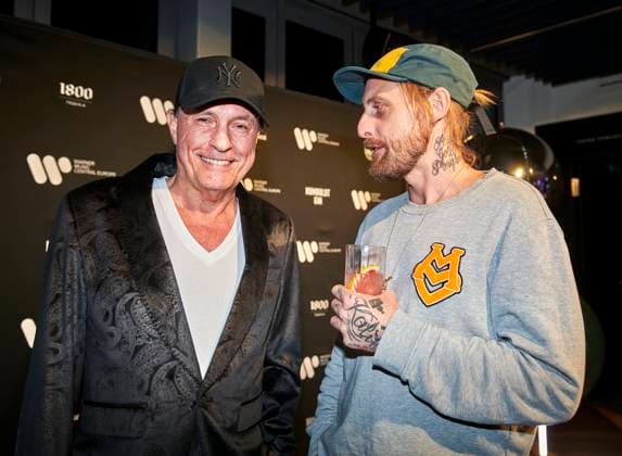 Warner Music Central Europe celebrates in Berlin EUR, Germany, Berlin Musician Peter Schilling left and musician David Oesterling right in conversation Warner Music celebrates the first anniversary of the Berlin location with artists, guests and employees The local and international creative scene networks in the capital city