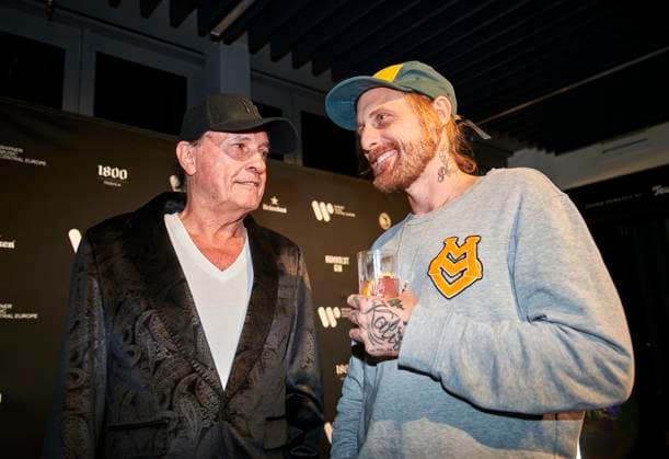 Warner Music Central Europe celebrates in Berlin EUR, Germany, Berlin Musician Peter Schilling left and musician David Oesterling right in conversation Warner Music celebrates the first anniversary of the Berlin location with artists, guests and employees The local and international creative scene networks in the capital city