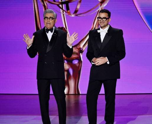 (L-R) Hosts Eugene Levy and Dan Levy appear onstage during the 76th annual Primetime Emmy Awards at the Peacock Theater in Los Angeles on Sunday, September 15, 2024.  LAP2024091512 JIMxRUYMEN