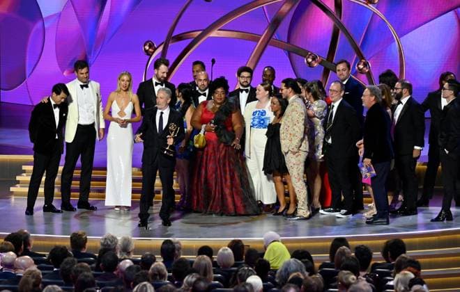 Jon Stewart (C), cast, and crew accept the Outstanding Talk Series award for The Daily Show onstage during the 76th annual Primetime Emmy Awards at the Peacock Theater in Los Angeles on Sunday, September 15, 2024.  LAP2024091573 JIMxRUYMEN