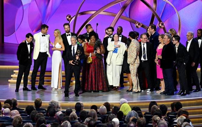 Jon Stewart (C), cast, and crew accept the Outstanding Talk Series award for The Daily Show onstage during the 76th annual Primetime Emmy Awards at the Peacock Theater in Los Angeles on Sunday, September 15, 2024.  LAP2024091574 JIMxRUYMEN