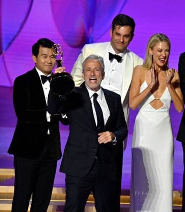 Jon Stewart (C), cast, and crew accept the Outstanding Talk Series award for The Daily Show onstage during the 76th annual Primetime Emmy Awards at the Peacock Theater in Los Angeles on Sunday, September 15, 2024.  LAP2024091578 JIMxRUYMEN
