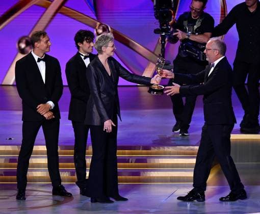 Frederick E.O. Toye (R) accepts the Outstanding Directing for a Drama Series award for Sh?gun from Jane Lynch onstage during the 76th annual Primetime Emmy Awards at the Peacock Theater in Los Angeles on Sunday, September 15, 2024.  LAP20240915129 JIMxRUYMEN