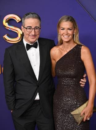 (L-R) John Oliver and Kate Norley arrive for the 76th annual Primetime Emmy Awards at the Peacock Theater in Los Angeles on Sunday, September 15, 2024.  LAP202409150862 CHRISxCHEW