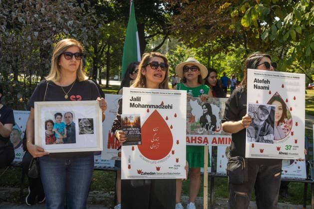 Toronto Second Anniversary Mahsa Amini Death Supporters participate in a protest marking the second anniversary of Mahsa Amini s death in memory of the Iranian victims of the Woman, Life, Freedom Movement in Toronto, Canada, on September 15, 2024. The nationwide protests started in Iran after the death of Mahsa Jina Amini, a 22-year-old girl who died under the custody of the Islamic Republic s Morality Police on September 16th, 2022, in Tehran. Toronto Ontario Canada Copyright: xPouriaxAfkhamix