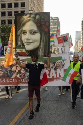 Toronto Second Anniversary Mahsa Amini Death Supporters participate in a protest marking the second anniversary of Mahsa Amini s death in memory of the Iranian victims of the Woman, Life, Freedom Movement in Toronto, Canada, on September 15, 2024. The nationwide protests started in Iran after the death of Mahsa Jina Amini, a 22-year-old girl who died under the custody of the Islamic Republic s Morality Police on September 16th, 2022, in Tehran. Toronto Ontario Canada Copyright: xPouriaxAfkhamix