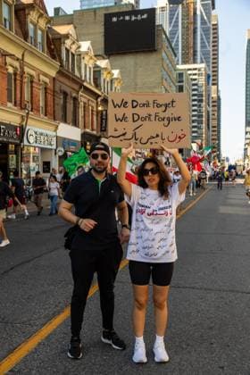 Toronto Second Anniversary Mahsa Amini Death Supporters participate in a protest marking the second anniversary of Mahsa Amini s death in memory of the Iranian victims of the Woman, Life, Freedom Movement in Toronto, Canada, on September 15, 2024. The nationwide protests started in Iran after the death of Mahsa Jina Amini, a 22-year-old girl who died under the custody of the Islamic Republic s Morality Police on September 16th, 2022, in Tehran. Toronto Ontario Canada Copyright: xPouriaxAfkhamix