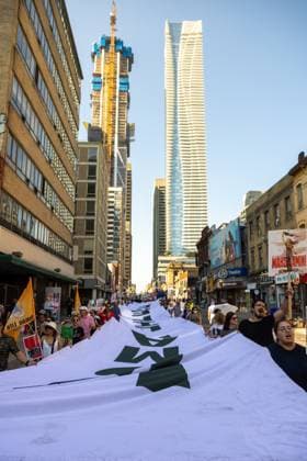 Toronto Second Anniversary Mahsa Amini Death Supporters participate in a protest marking the second anniversary of Mahsa Amini s death in memory of the Iranian victims of the Woman, Life, Freedom Movement in Toronto, Canada, on September 15, 2024. The nationwide protests started in Iran after the death of Mahsa Jina Amini, a 22-year-old girl who died under the custody of the Islamic Republic s Morality Police on September 16th, 2022, in Tehran. Toronto Ontario Canada Copyright: xPouriaxAfkhamix