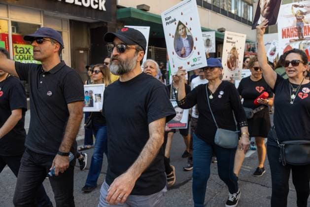 Toronto Second Anniversary Mahsa Amini Death Hamed Esmaeilion, a prominent Iranian opposition figure, attends a protest marking the second anniversary of Mahsa Amini s death in memory of the Iranian victims of the Woman, Life, Freedom Movement in Toronto, Canada, on September 15, 2024. The nationwide protests started in Iran after the death of Mahsa Jina Amini, a 22-year-old girl who died under the custody of the Islamic Republic s Morality Police on September 16th, 2022, in Tehran. Toronto Ontario Canada Copyright: xPouriaxAfkhamix