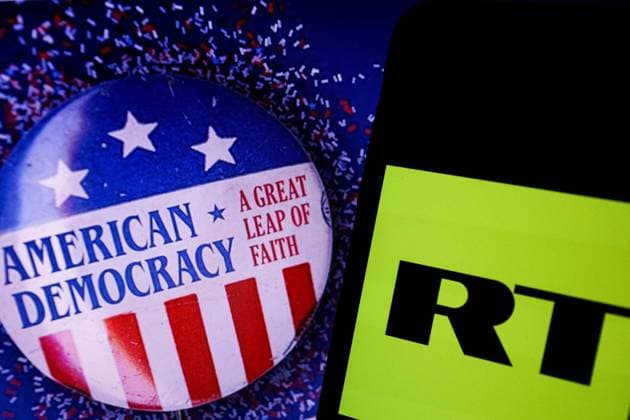 September 17, 2024, Gaziantep, Turkiye: Gaziantep, Turkiye. 17 September 2024. The RT logo on a smartphone with the US flag in the background. Meta has announced a ban on RT, Rossiya Segodnya, and other Russian state media networks from its social media platforms. The social media company has cited foreign interference activity as the reason for the ban. The move follows accusations by the US of RT carrying out covert operations aimed at interfering in foreign elections, while also unveiling sanctions against the Russian media outlet Gaziantep Turkiye - ZUMAd99_ 20240917_zap_d99_014 Copyright: xZakariyaxYahyax