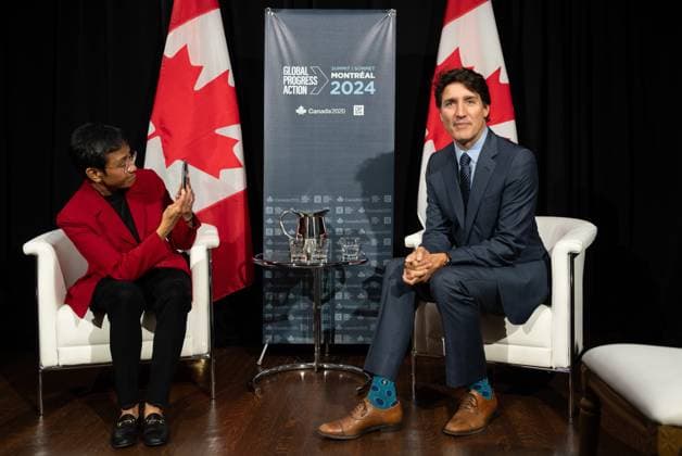 September 21, 2024, Montreal, Pq, CANADA: Nobel Peace Prize Winner, Maria Ressa, left, takes a photo of Prime Minister Justin Trudeau as they meet for a bilateral meeting at the Global Progress Action Summit, in Montreal, Saturday, Sept. 21, 2024. Montreal CANADA - ZUMAc35_ 20240921_zaf_c35_066 Copyright: xChristinnexMuschix