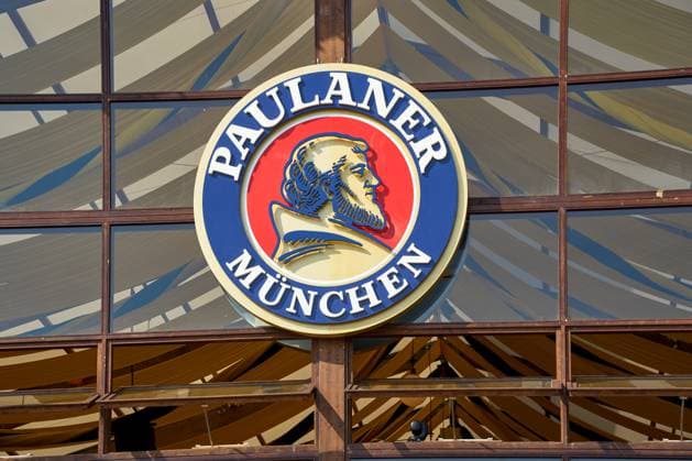Munich, Bavaria, Germany - September 23, 2024: The Paulaner logo adorns the facade of a marquee at the Oktoberfest in Munich. Paulaner is one of the city s best-known breweries and stands for Bavarian brewing art and tradition