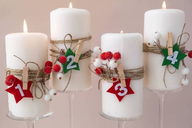 Traditional four advent weeks calendar before Christmas holidays. Candles and plastic free zero waste sustainable decoration. Copy space greeting card mock up template. Winter cozy Traditional four advent weeks calendar before Christmas holidays. Candles and plastic free zero waste sustainable decoration. Copy space greeting card mock up template. Winter cozy home time Copyright: xZoonar.com AnastasiiaxYanishevskax 22239923