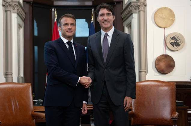 September 26, 2024, Ottawa, On, Canada: Prime Minister Justin Trudeau, right, and French President Emmanuel Macron shake hands before meeting on Parliament Hill, Thursday, September 26, 2024 in Ottawa. Ottawa Canada  - ZUMAc35_ 20240926_zaf_c35_016 Copyright: xAdrianxWyldx