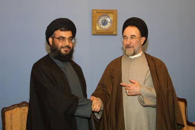 Israeli Military Says Hezbollah Leader Hassan Nasrallah Killed File photo - Lebanese Hezbollah militia leader, Hassan Nasrallah shakes hands with former Iranian President in Tehran on April 2001. The Israeli military claims that Hassan Nasrallah, secretary-general of Hezbollah, was killed in Friday’s airstrike in Beirut, Lebanon. Hezbollah has not yet commented. Photo by Farzaneh Khademian ABACAPRESS.COM Tehran - Iran  Copyright: xKhademianxFarzaneh ABACAx