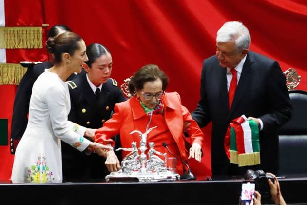 Outgoing President Andres Manuel Lopez Obrador and President of the Chamber of Deputies Ifigenia MartoÂ­nez during the symbolic act of handing over the presidential sash to Claudia Sheinbaum Pardo as the new female president of Mexico during the inauguration ceremony at the Congress of the Union. on October 1, 2024 in Mexico City, Mexico. Mexico City Mexico - ZUMAe321 20241001_zia_e321_028 Copyright: xCarlosxSantiagox